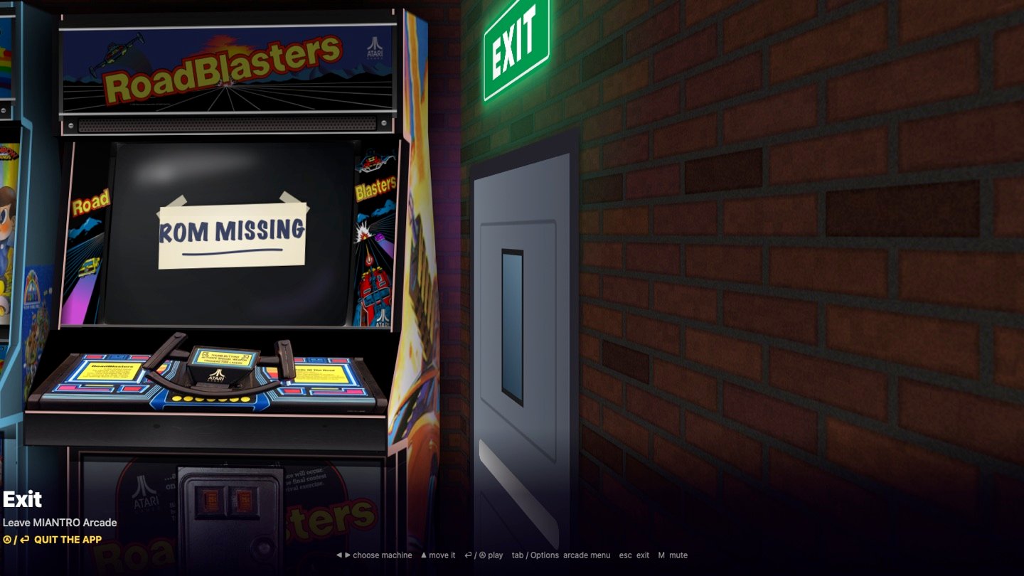 The exit door at the end of the hall, next to a Road Blasters cabinet with a ROM MISSING sign